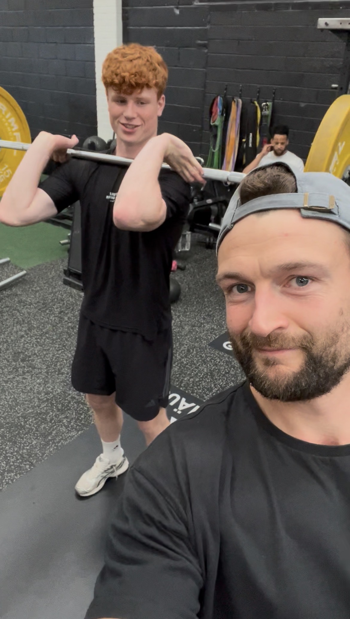 Ollie Burman coaching a client at Graft Haus Gym